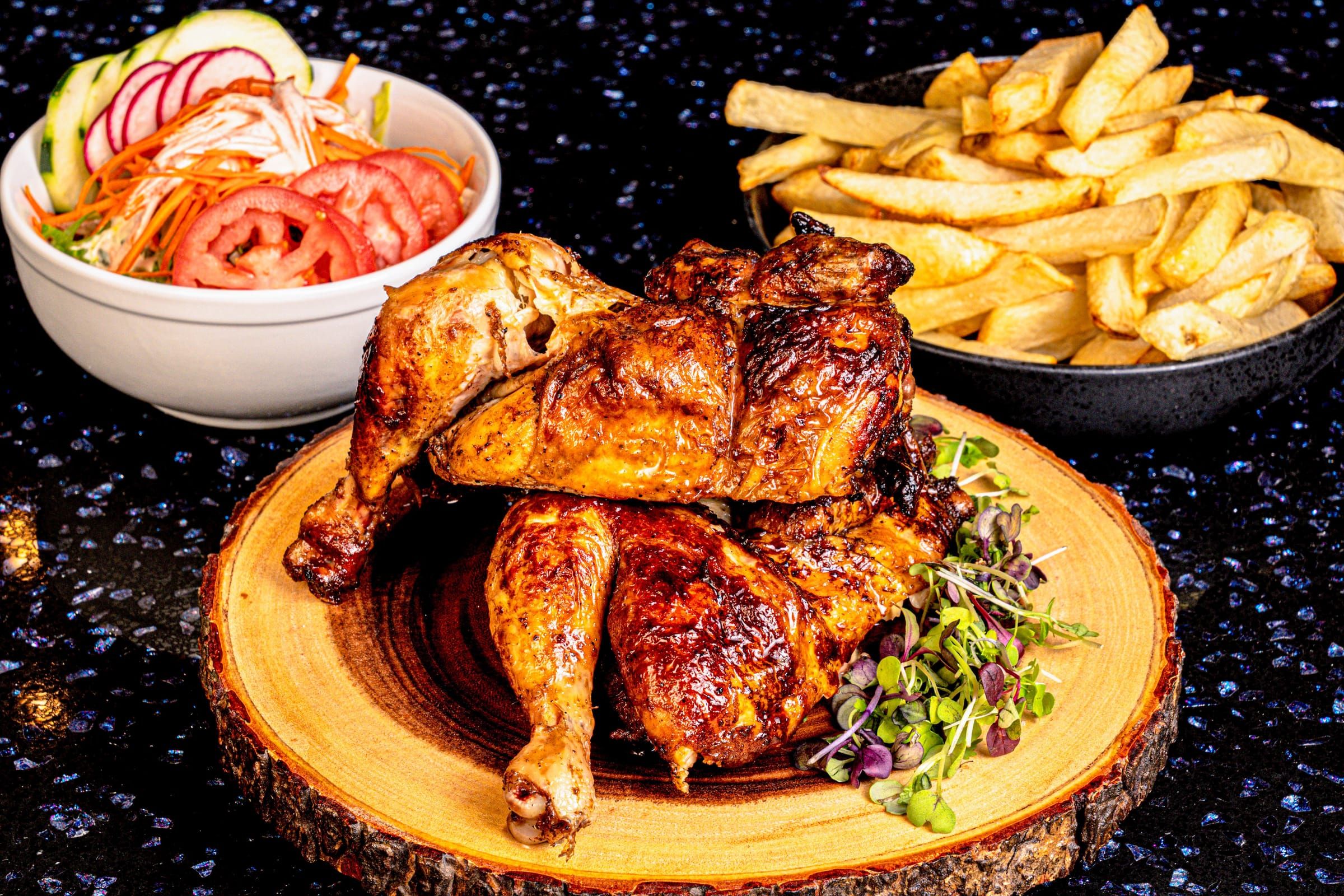 Charcoal-roasted chicken on the board