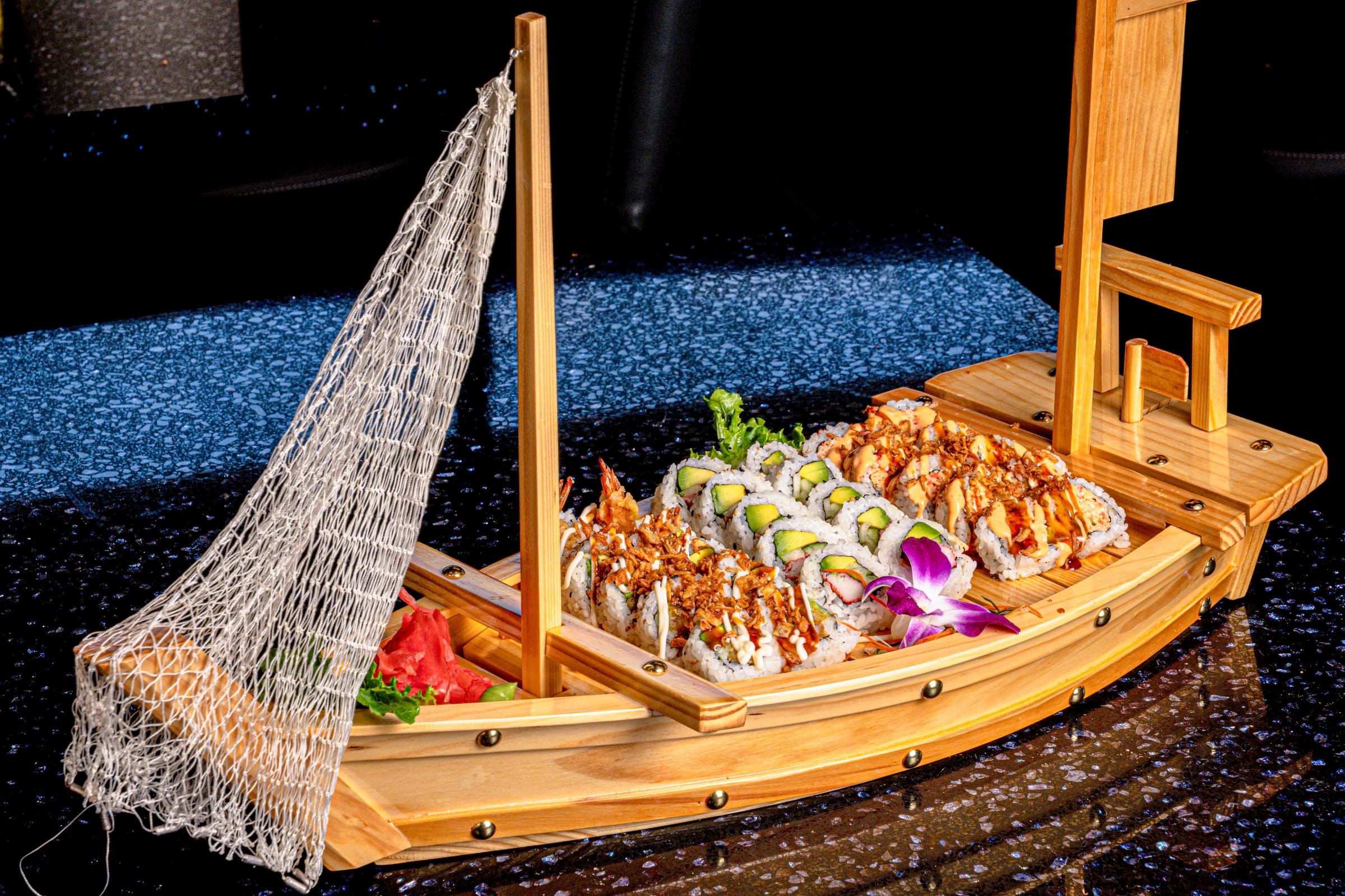 Peruvian sushi boat loaded with Nikkei rolls